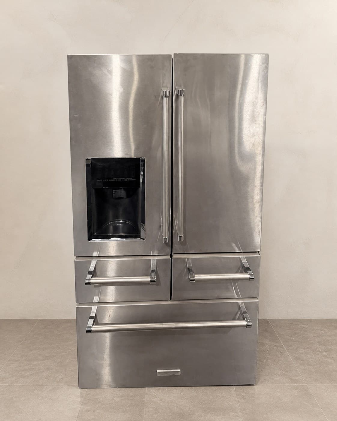 Actual KitchenAid KRMF706ESS01 stainless steel five-door refrigerator photographed in the showroom