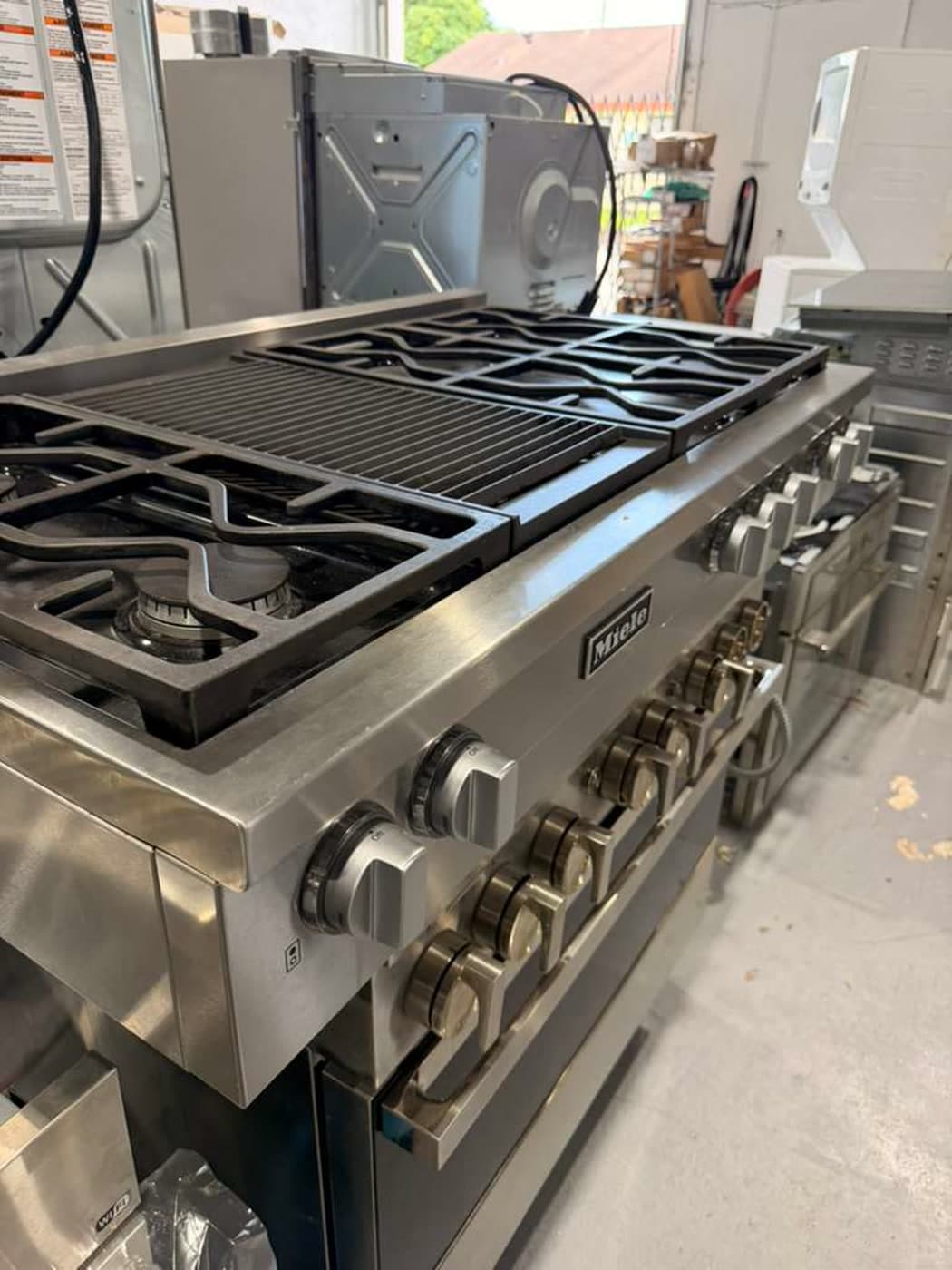 Actual miele 48-inch dual-fuel range photographed in Oakland Park — view 1