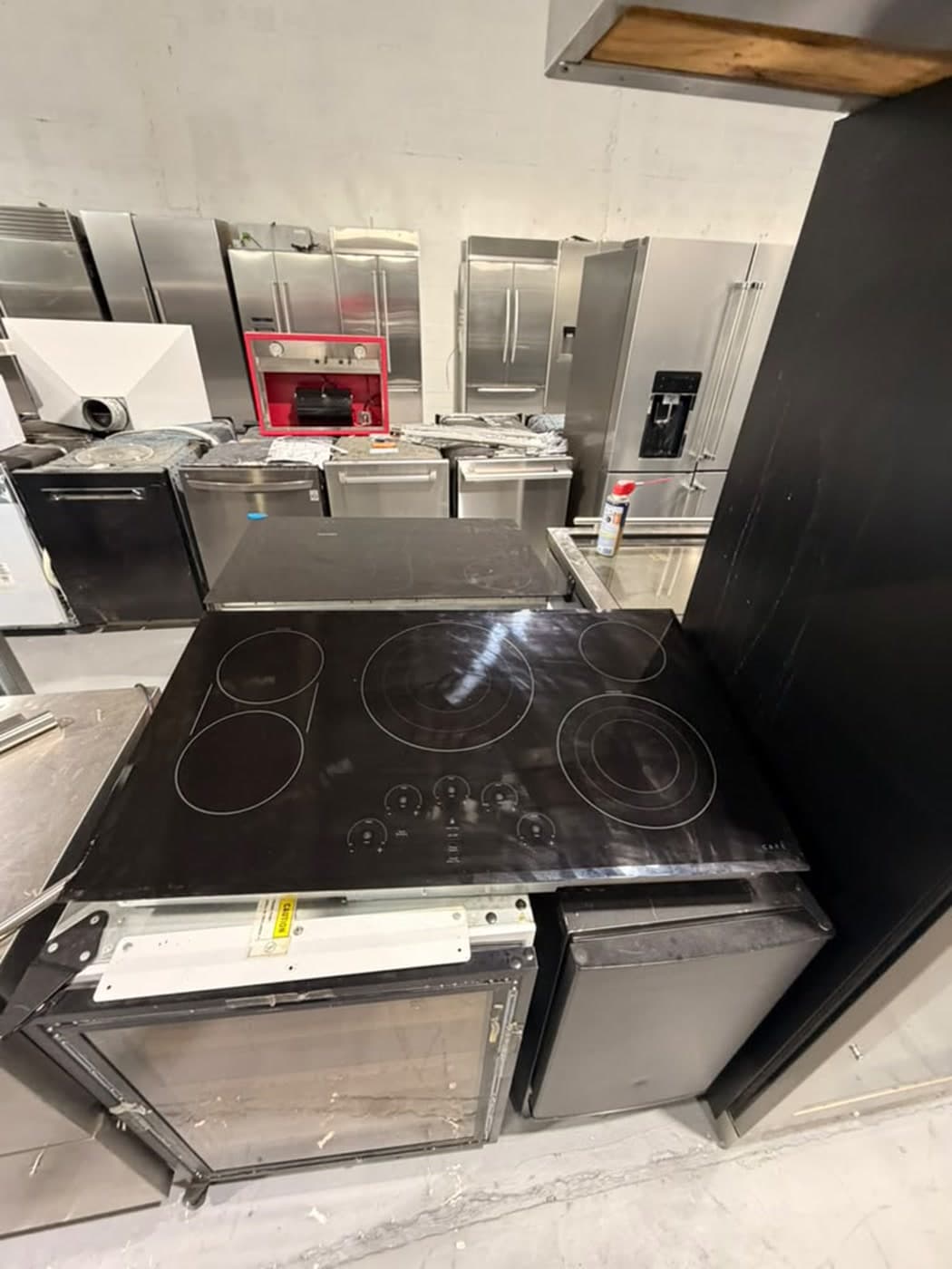 Actual café 36-inch electric cooktop photographed in Oakland Park — actual unit · front overview