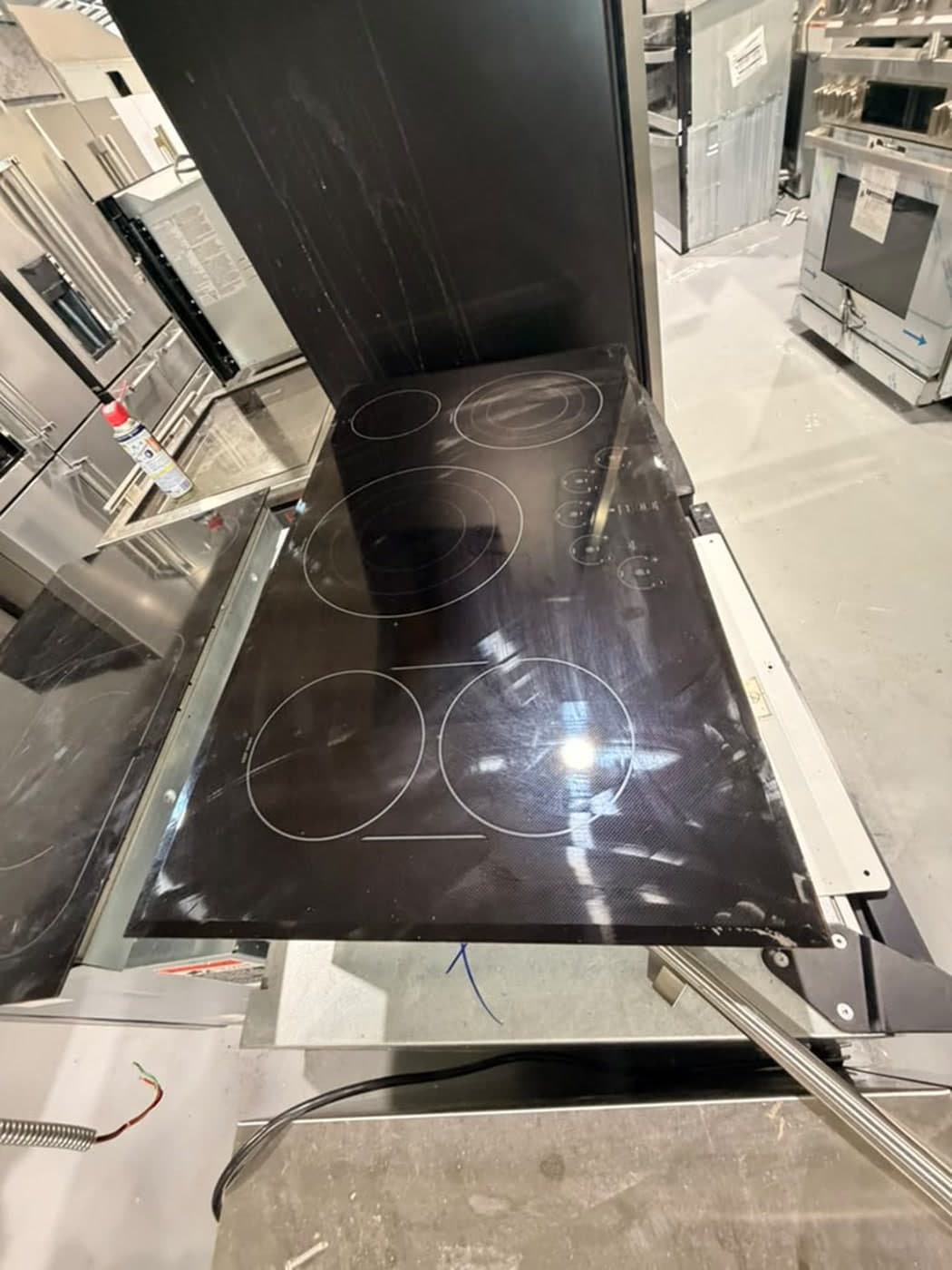 Actual café 36-inch electric cooktop photographed in Oakland Park — actual unit · alternate overview