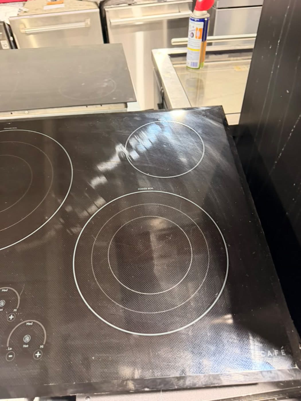 Actual café 36-inch electric cooktop photographed in Oakland Park — actual unit · cooking surface and controls