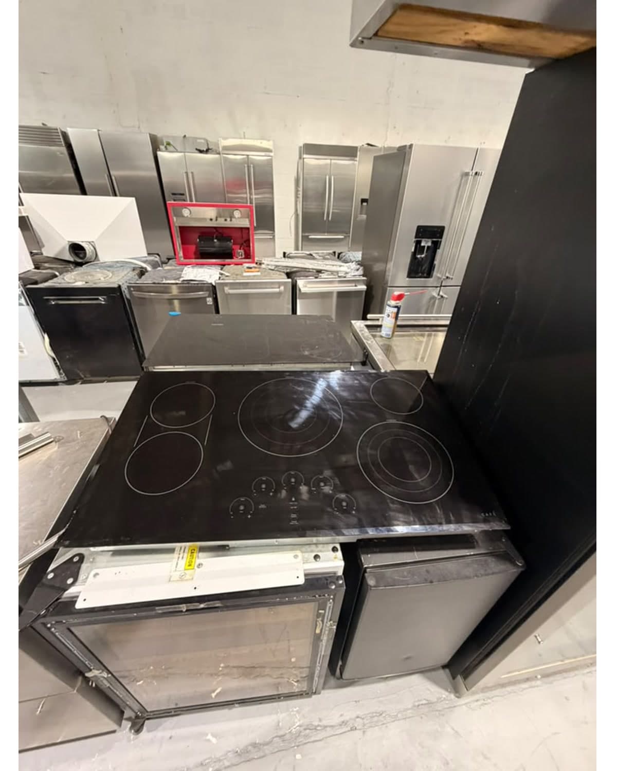 Actual café 36-inch electric cooktop photographed in Oakland Park