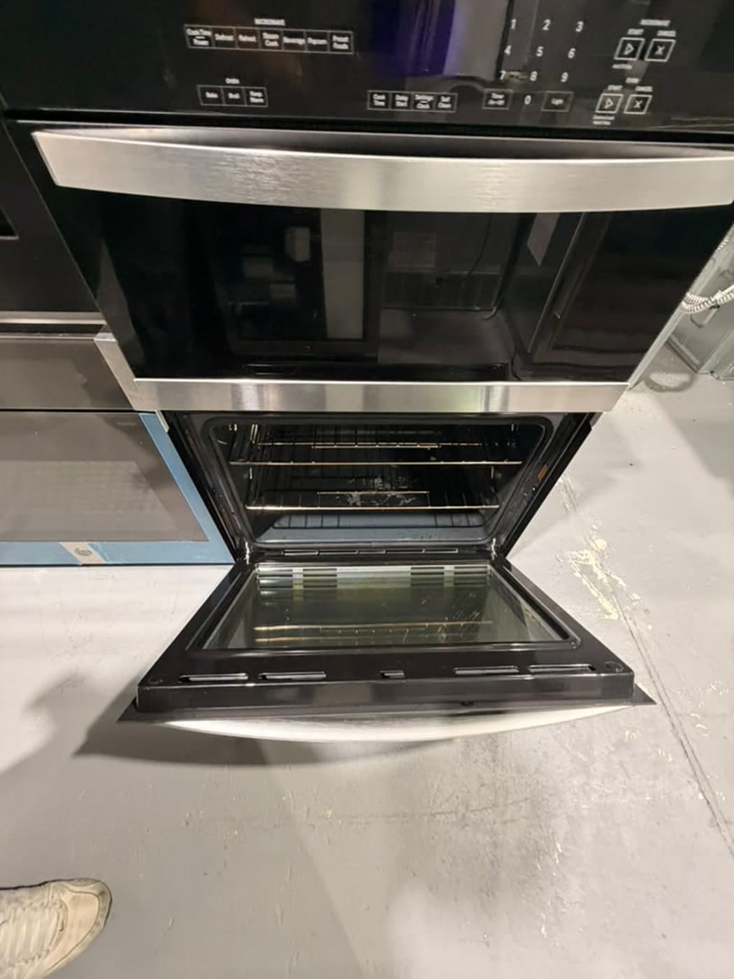 Actual whirlpool 30-inch combination wall oven photographed in Oakland Park — actual unit · lower oven open
