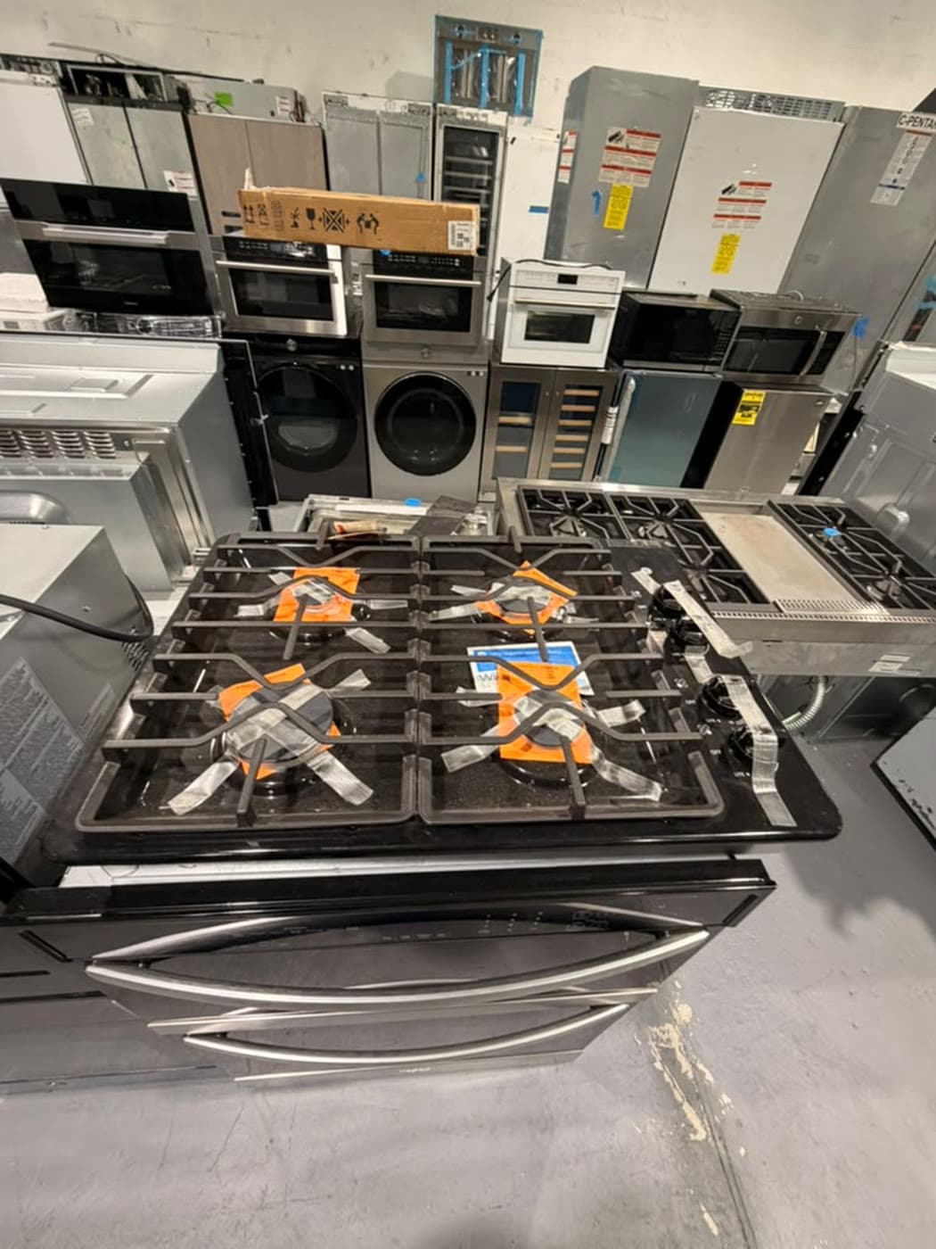 Actual ge 30-inch gas cooktop photographed in Oakland Park — actual unit · front angle