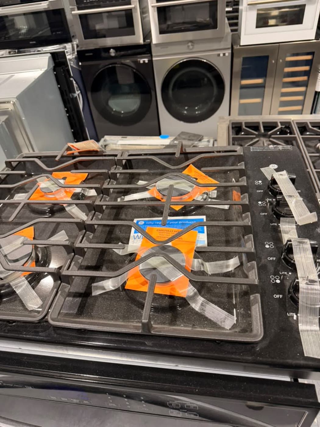 Actual ge 30-inch gas cooktop photographed in Oakland Park — actual unit · burner and packaging detail