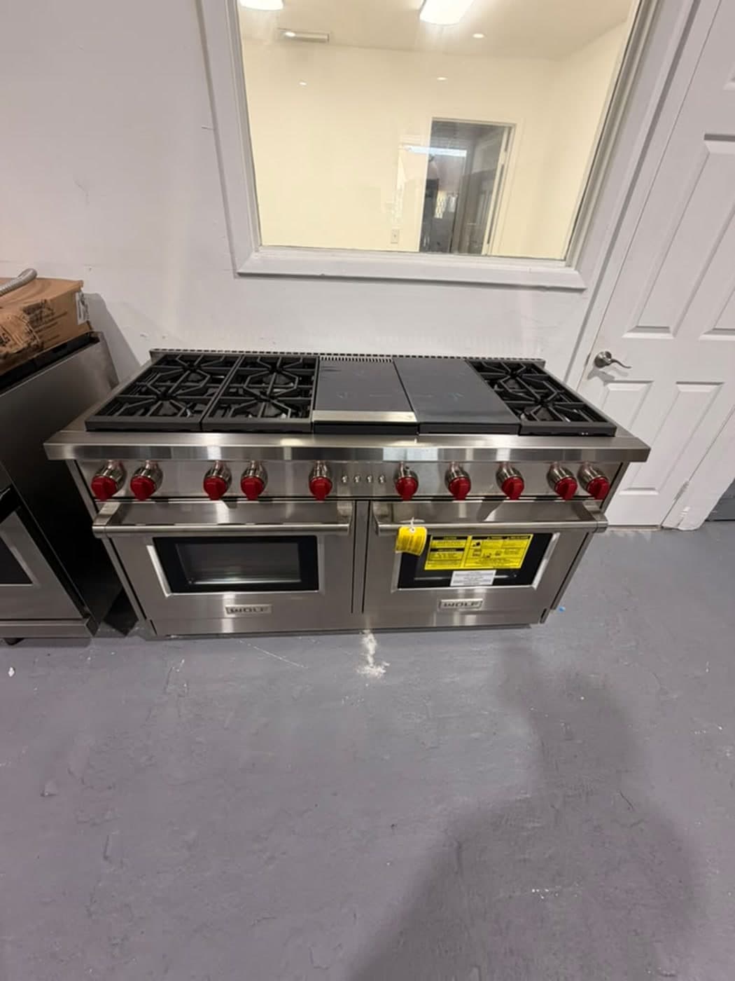 Actual wolf 60-inch professional gas range photographed in Oakland Park — actual wolf range · complete front overview