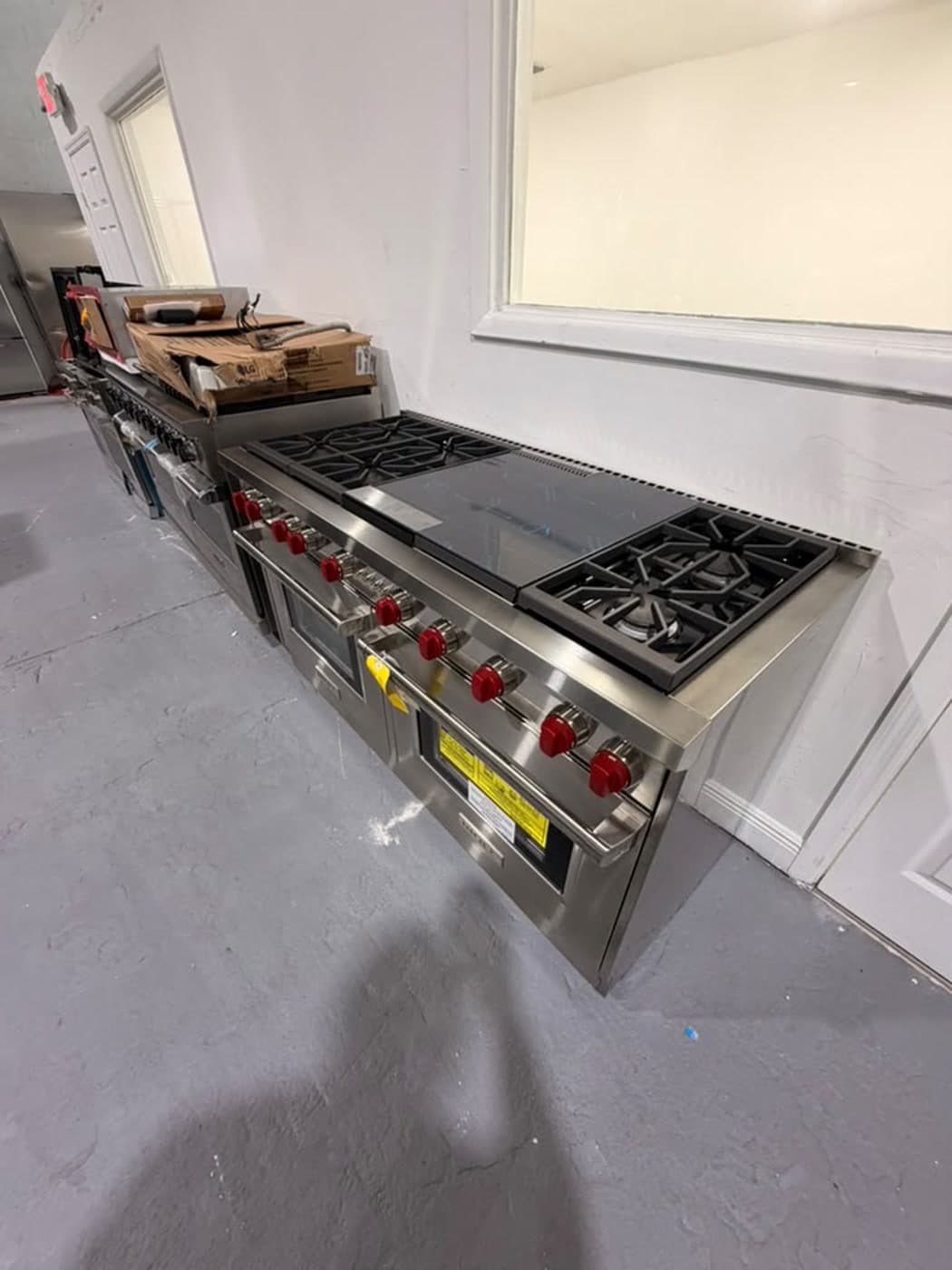 Actual wolf 60-inch professional gas range photographed in Oakland Park — actual wolf range · right-front overview