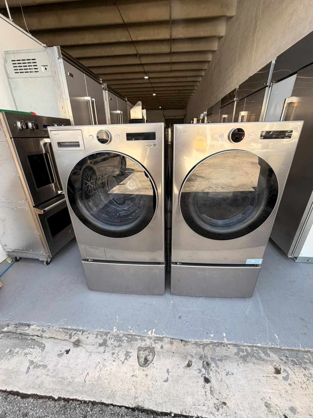 Actual lg 27-inch washer and dryer set photographed in Oakland Park — actual set · closed front overview