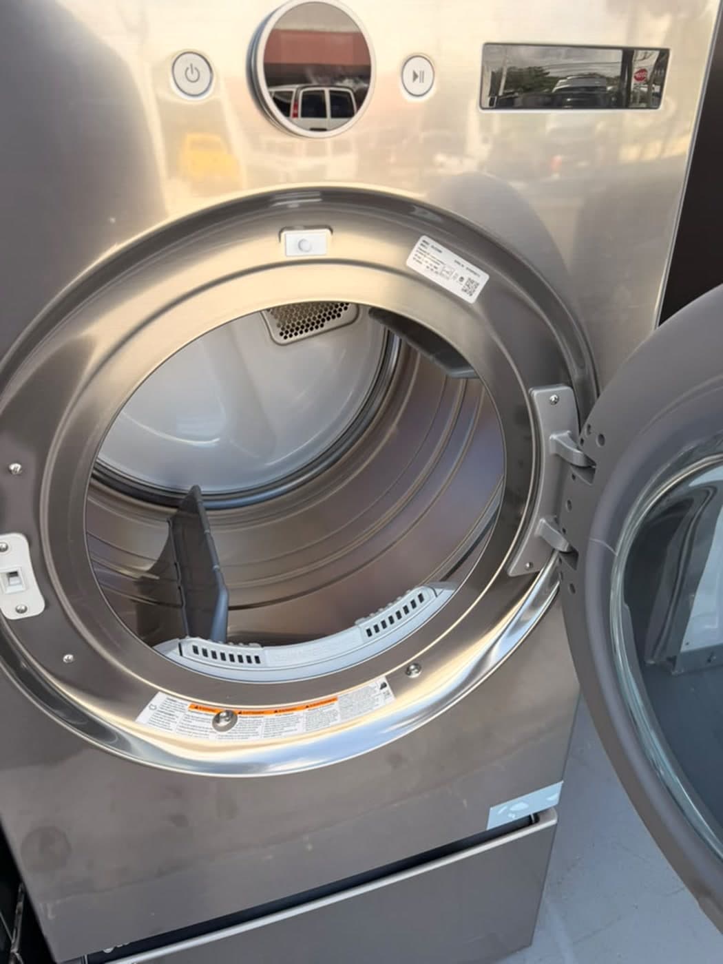 Actual lg 27-inch washer and dryer set photographed in Oakland Park — actual washer · interior