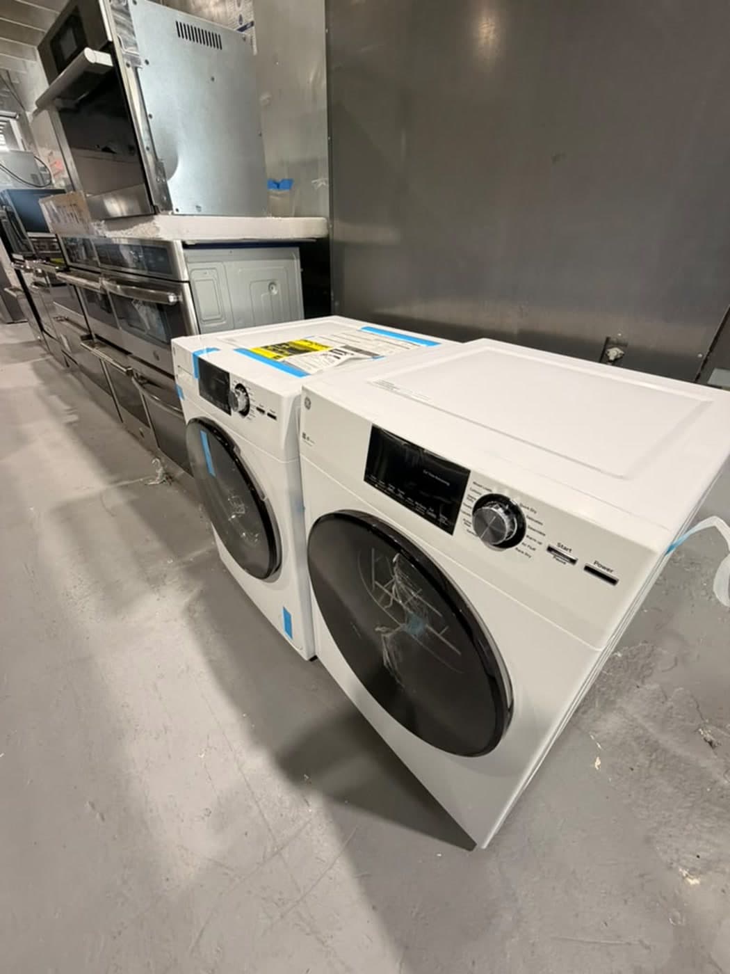 Actual ge 24-inch washer and dryer set photographed in Oakland Park — actual set · side angle