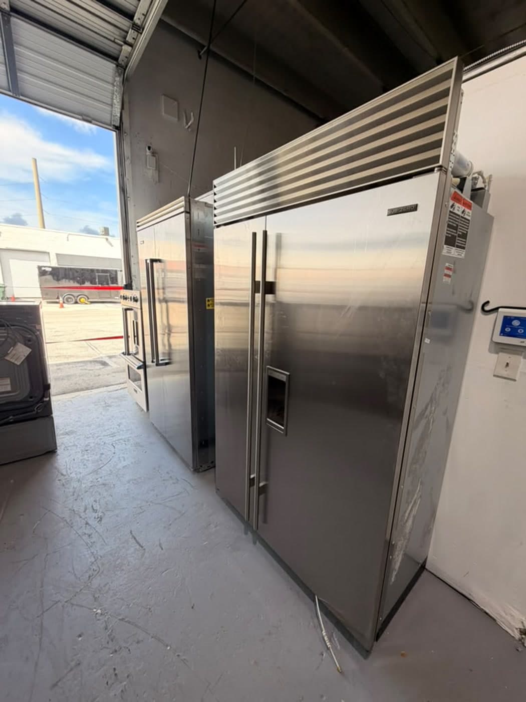 Actual sub-zero 48-inch side-by-side refrigerator photographed in Oakland Park — actual unit · alternate front angle