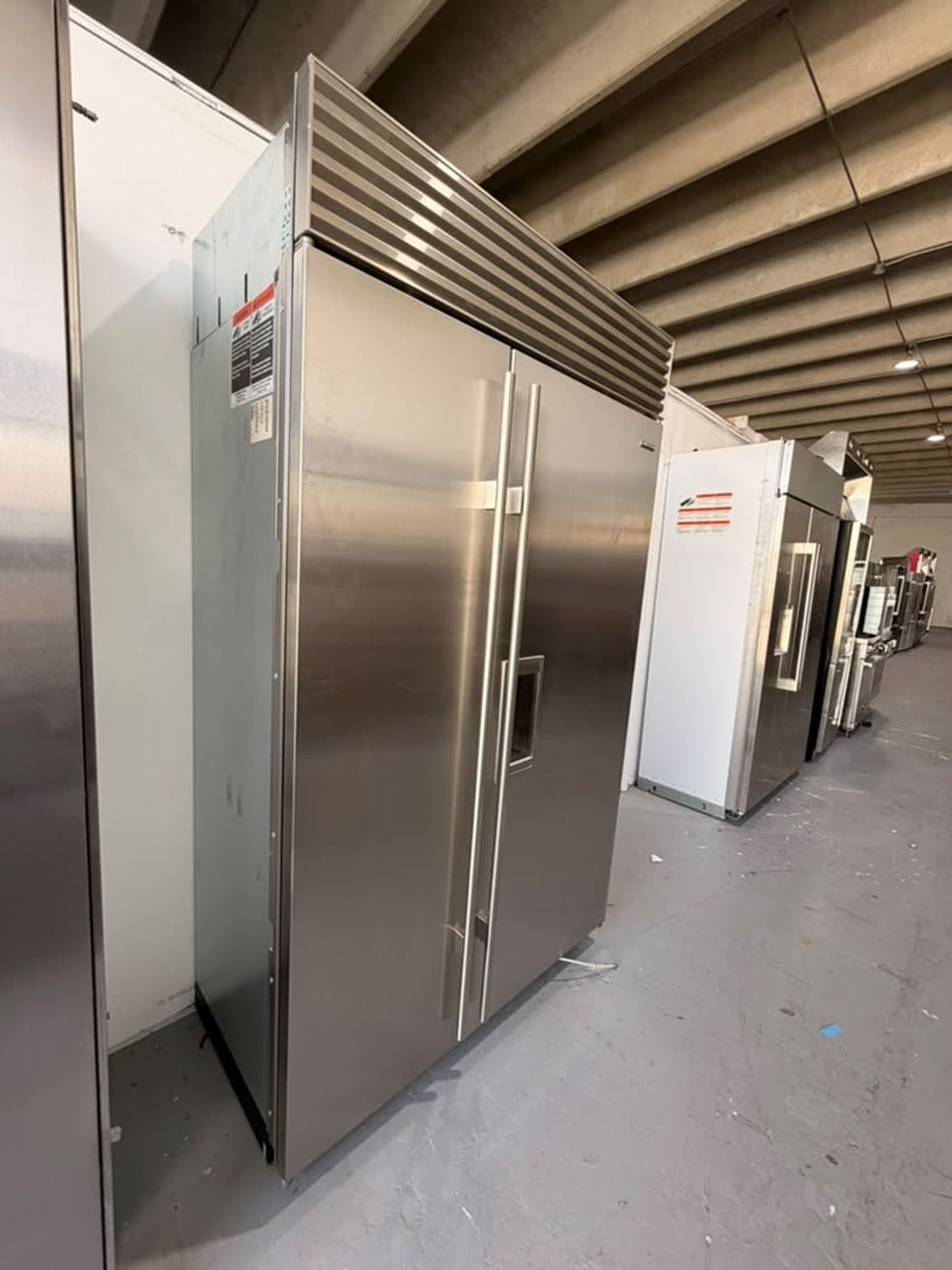 Actual sub-zero 48-inch side-by-side refrigerator photographed in Oakland Park — actual unit · interior overview