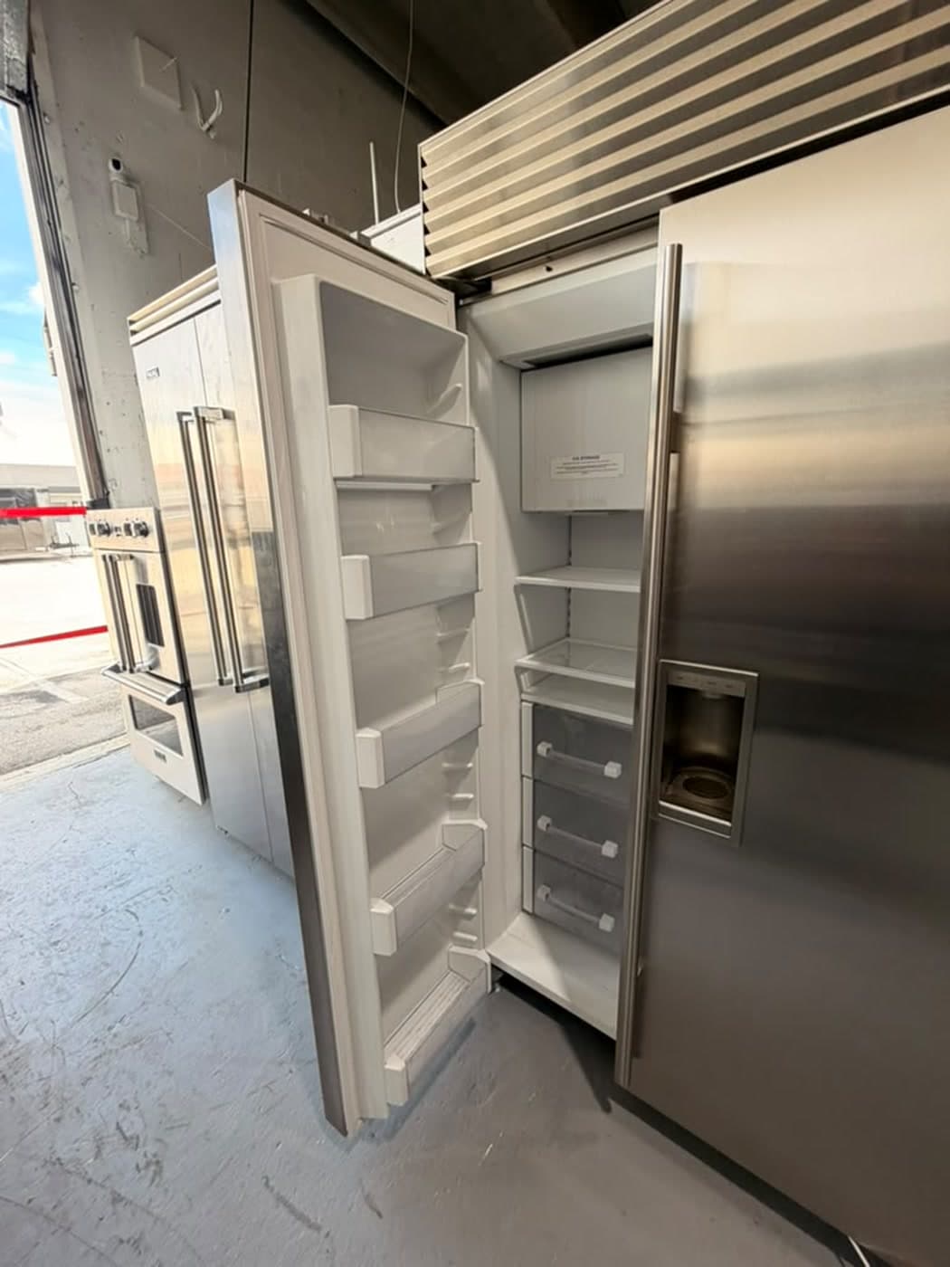 Actual sub-zero 48-inch side-by-side refrigerator photographed in Oakland Park — actual unit · alternate interior view