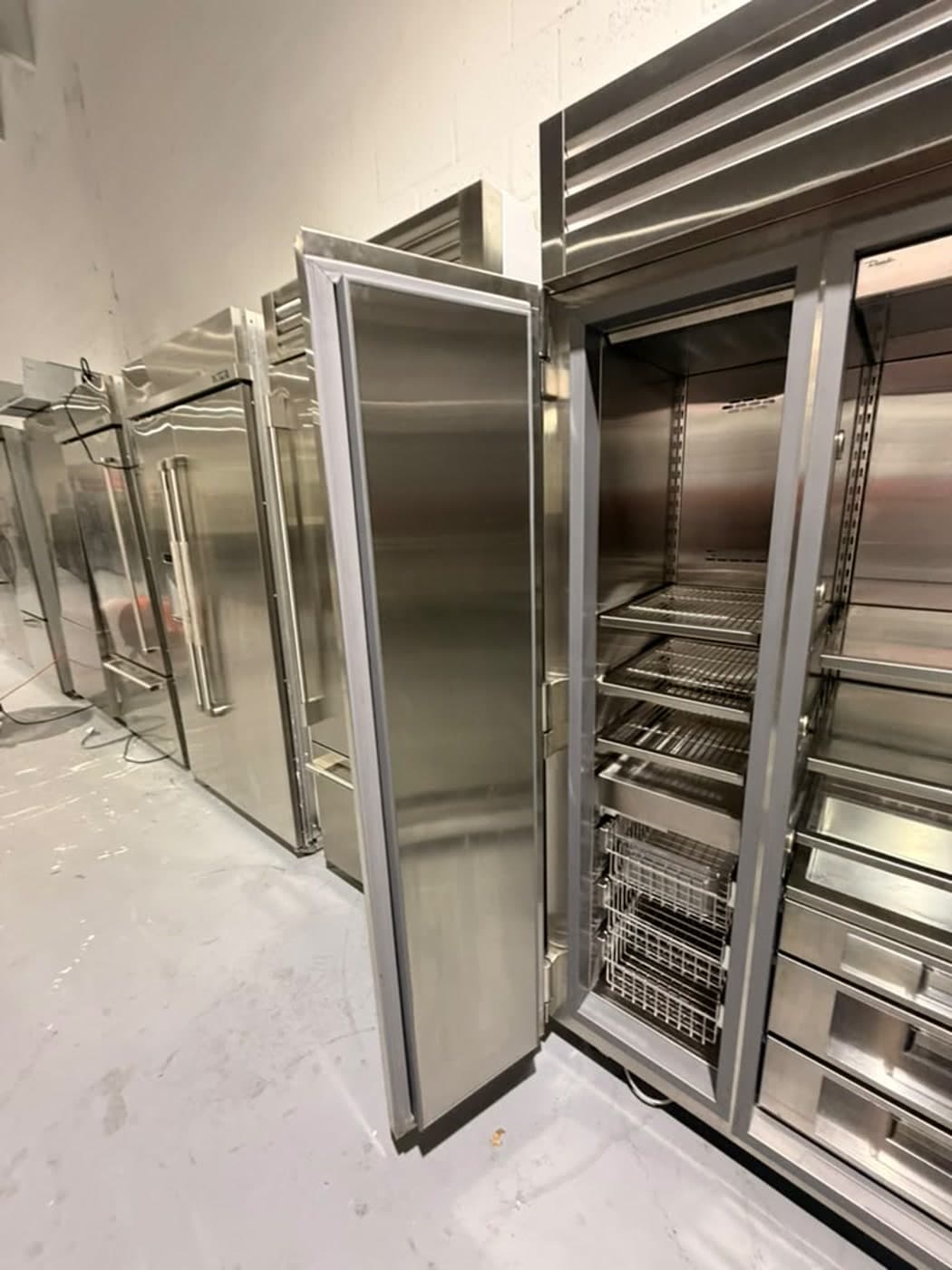 Actual true residential 48-inch glass-door refrigerator photographed in Oakland Park — actual unit · alternate open interior