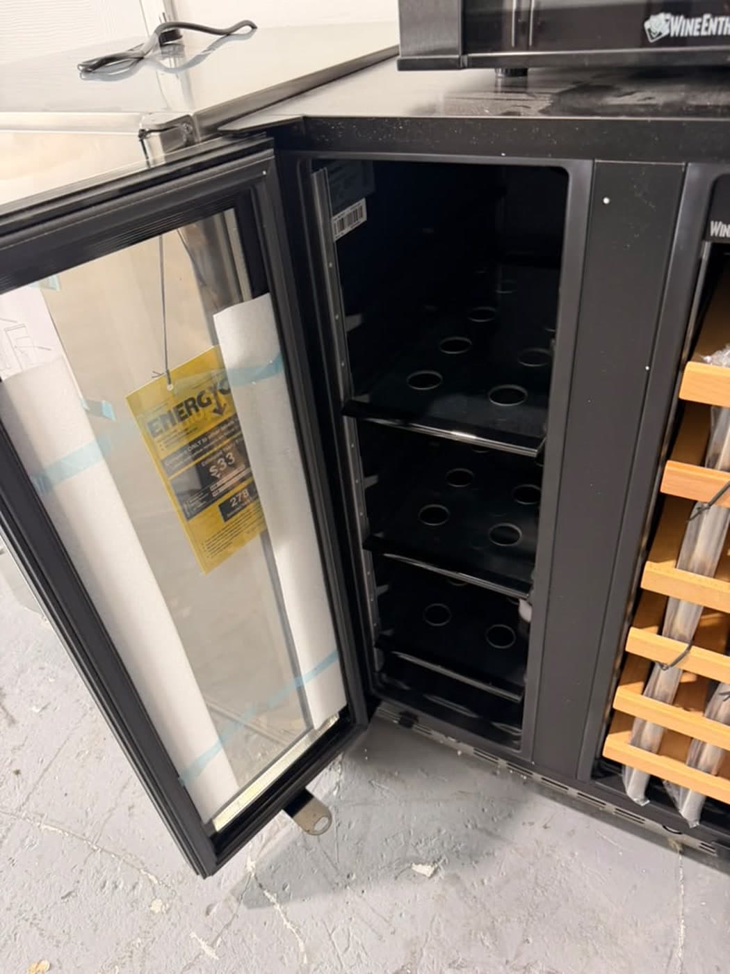 Actual wine enthusiast 24-inch wine & beverage center photographed in Oakland Park — actual unit · beverage-side interior