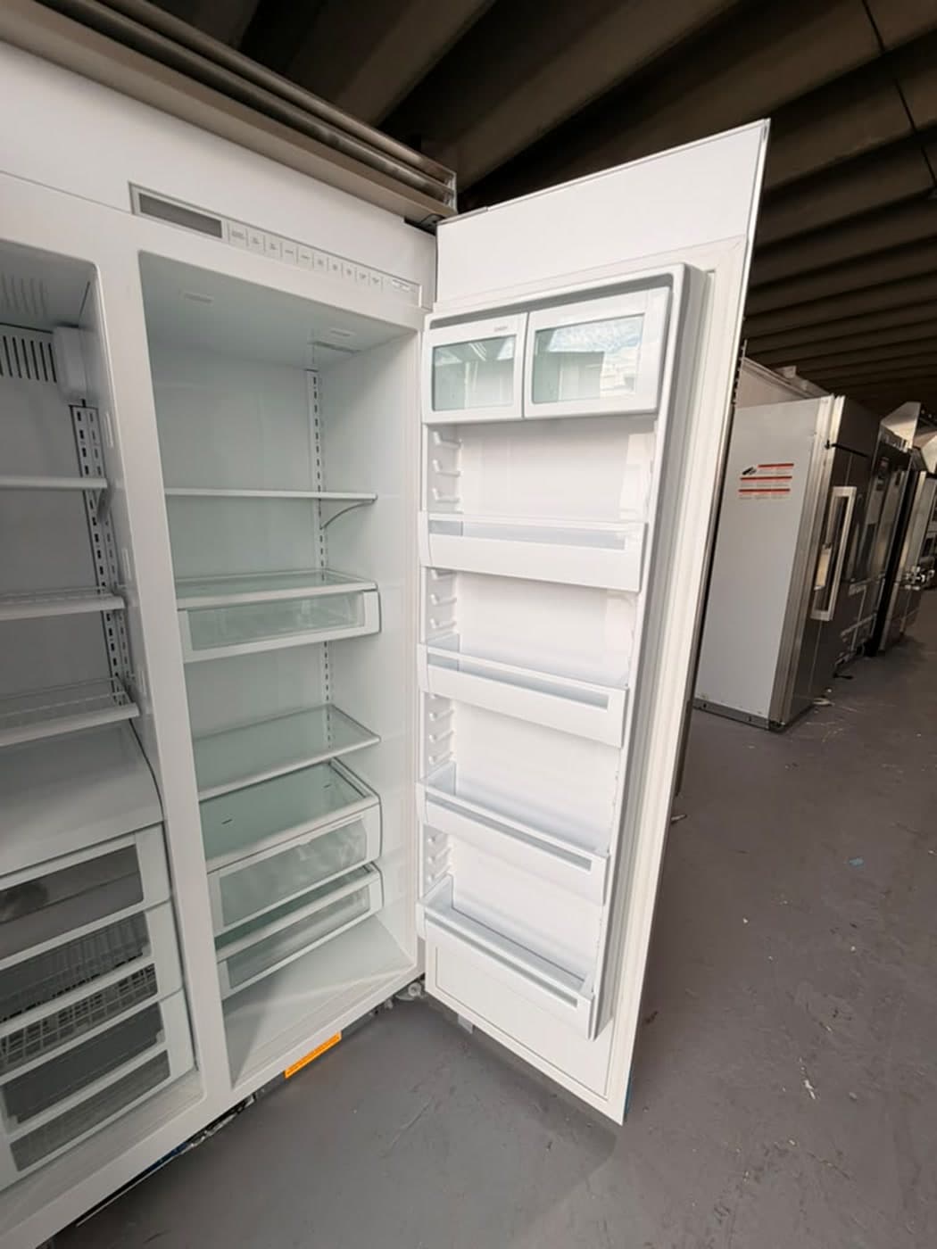 Actual viking 42-inch side-by-side refrigerator photographed in Oakland Park — actual unit · open interior