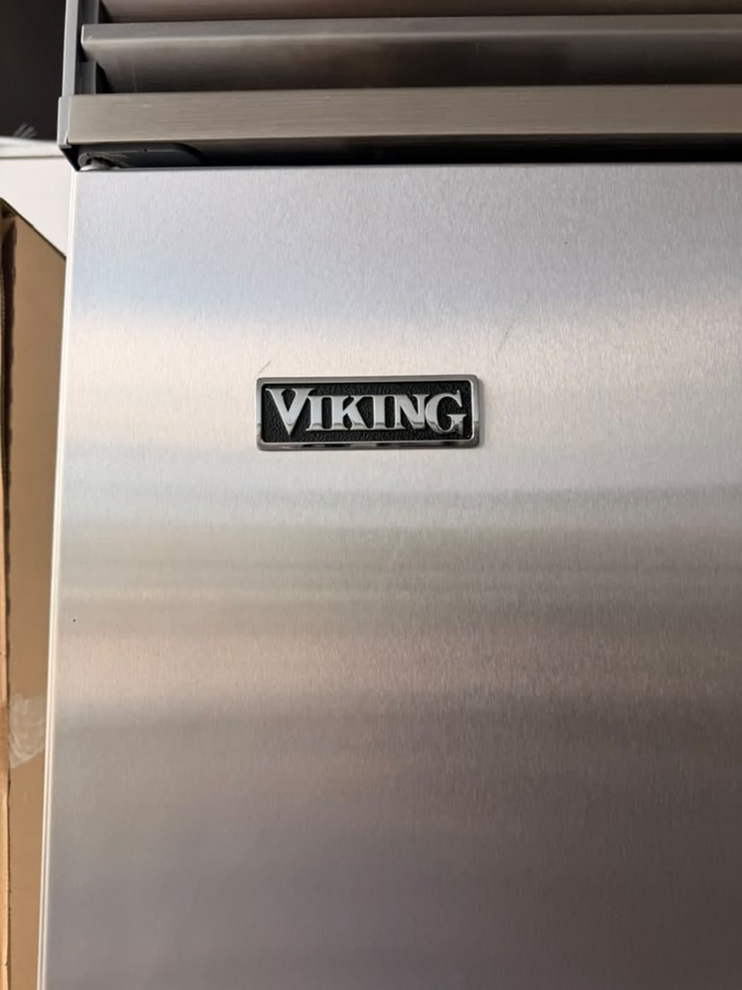 Actual viking 42-inch side-by-side refrigerator photographed in Oakland Park — actual unit · viking badge detail