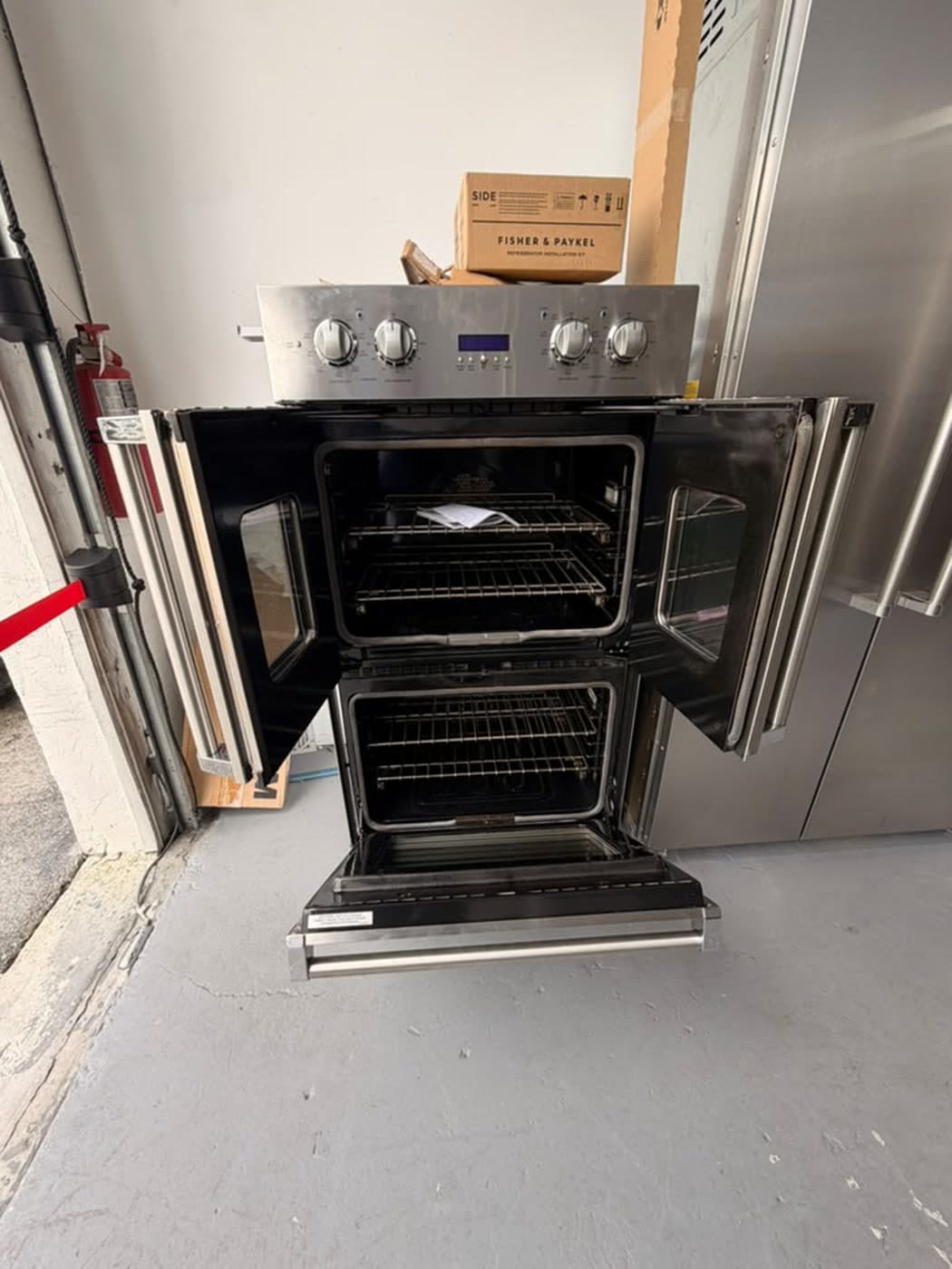 Actual viking 30-inch french-door double wall oven photographed in Oakland Park — actual unit · both ovens open