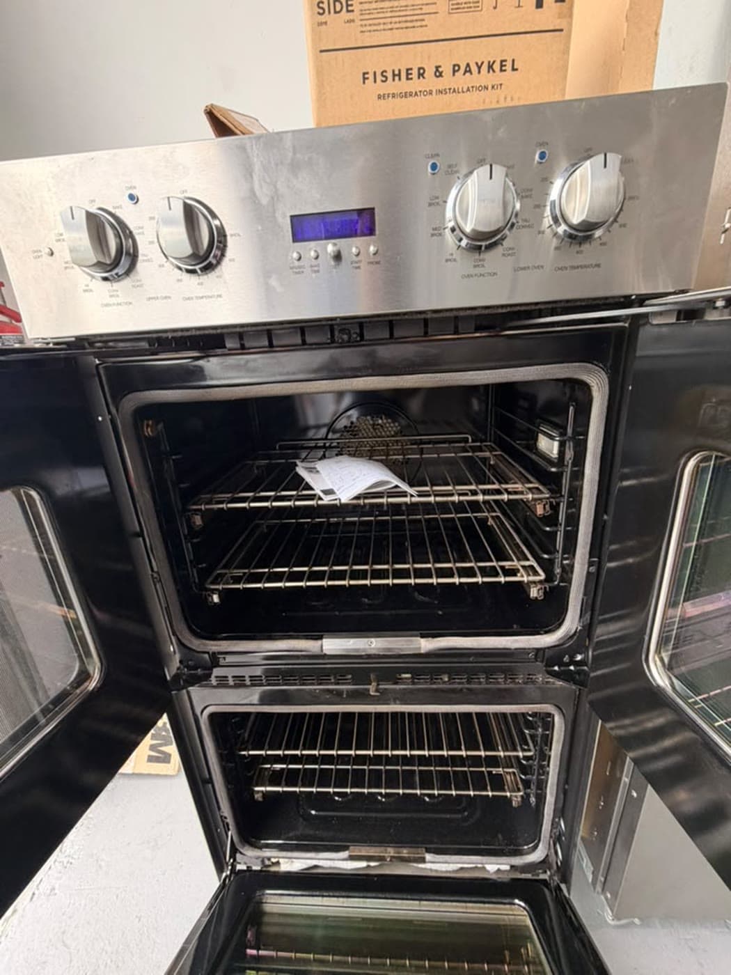 Actual viking 30-inch french-door double wall oven photographed in Oakland Park — actual unit · upper and lower oven interiors