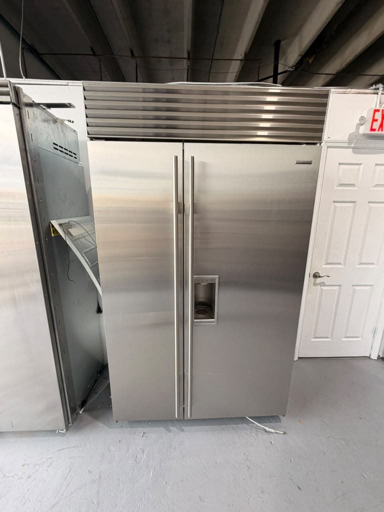 Actual sub-zero 48-inch side-by-side refrigerator with dispenser photographed in Oakland Park