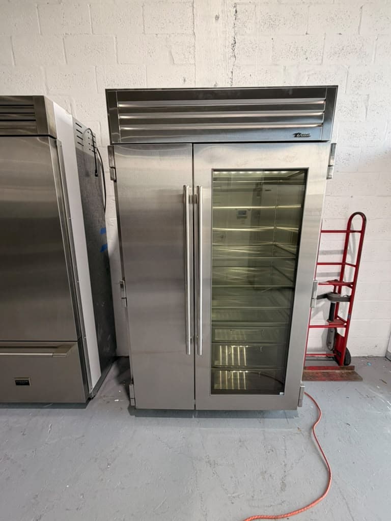 Actual true residential 48-inch refrigerator with glass door photographed in Oakland Park